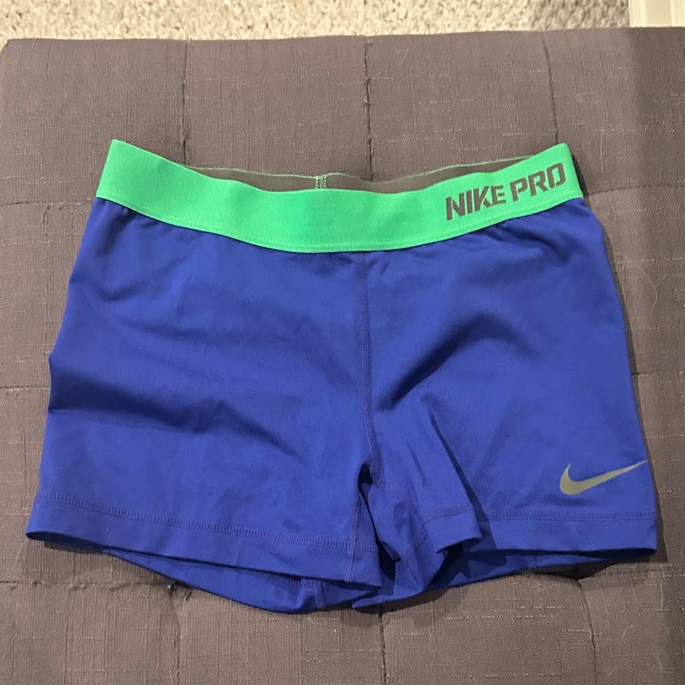 Nike Pro Blue Shorts with Green Waistband
